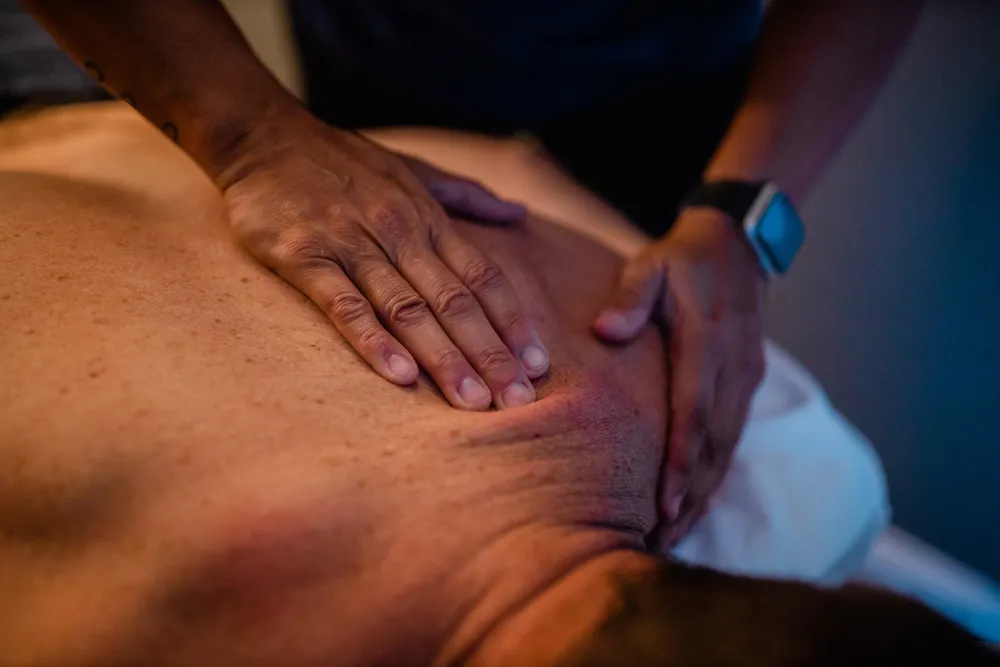 Chiropractic care in a treatment room at a chiropractic practice