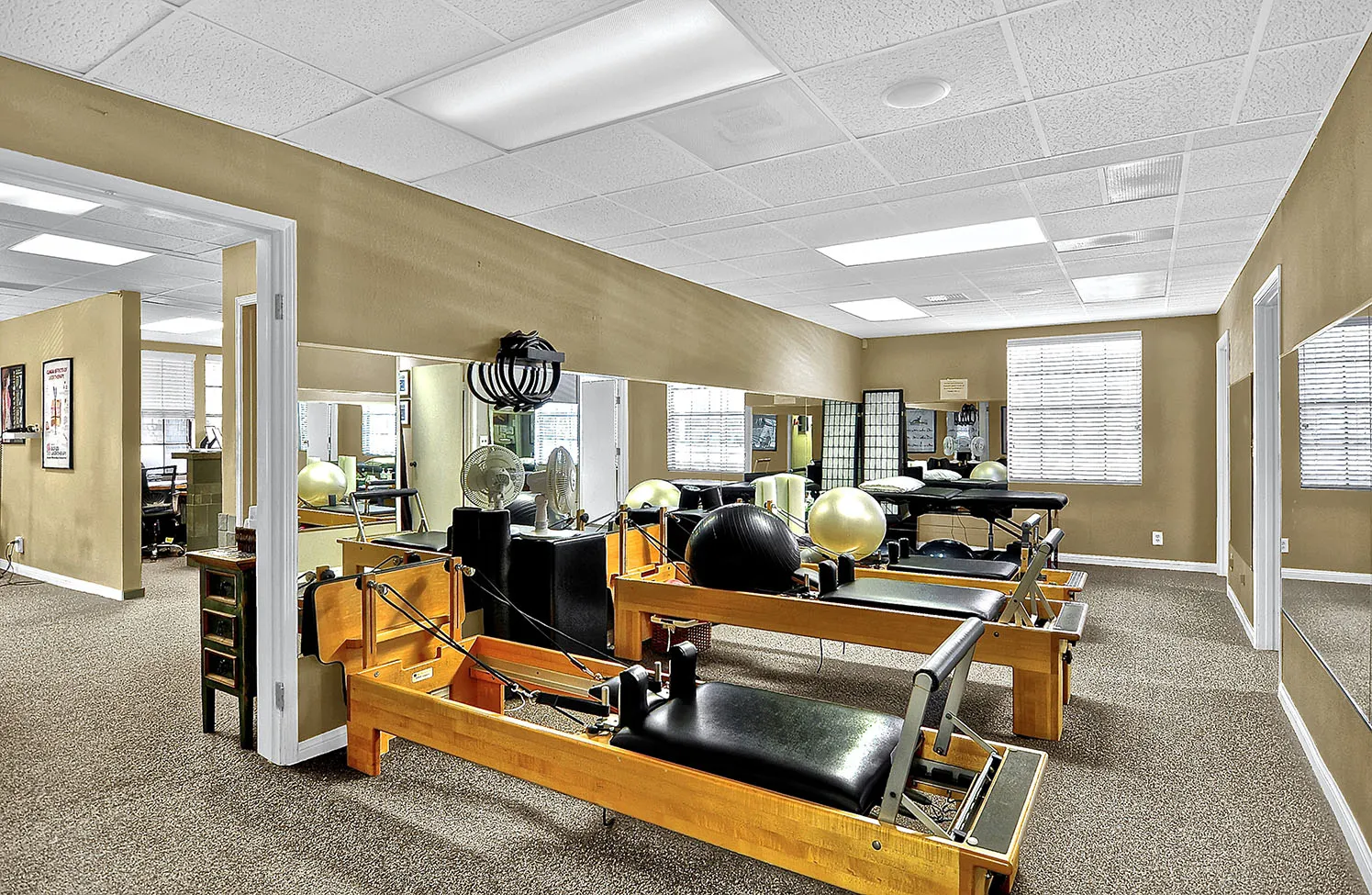 Chiropractic practice office space with treatment equipment
